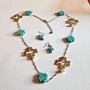 Gold tone cross and bead necklace with earrings